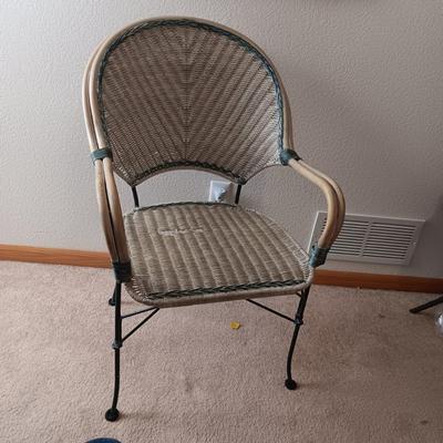 SIGNED AND NUMBERED PICTURE OF KAFFIR LILY AND A WICKER ARM CHAIR