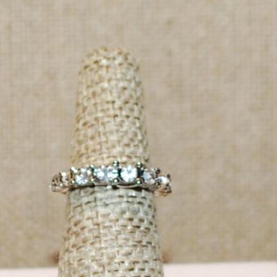 Size 5¼ Row of 11 Clear Stones Ring on a Silver Tone Band (2.8g)