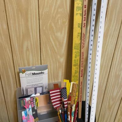 Yard sticks and office supplies