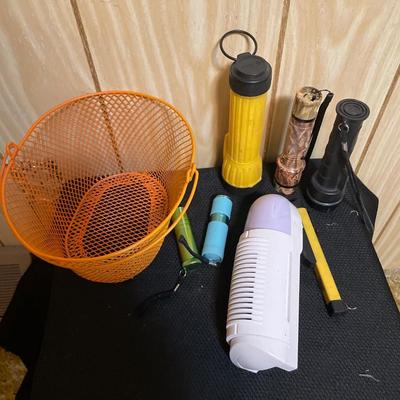 Flashlight and orange basket