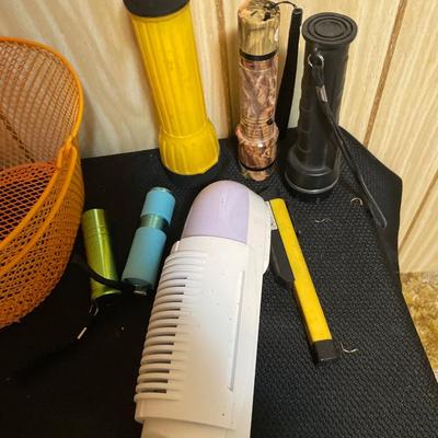 Flashlight and orange basket