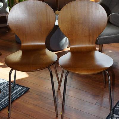PAIR OF PRESSED TEAK PLYWOOD CHAIRS WITH CHROME BASE - THE PERFECT STACKABLE SIDE CHAIR FOR THE MCM HOME
