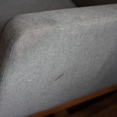MCM STYLE UPHOLSTERED WITH WOOD BASE ROCKER IN LIGHT GREY FABRIC