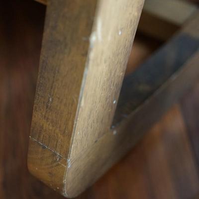 MCM STYLE UPHOLSTERED WITH WOOD BASE ROCKER IN LIGHT GREY FABRIC