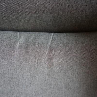 MCM STYLE UPHOLSTERED WITH WOOD BASE ROCKER IN LIGHT GREY FABRIC