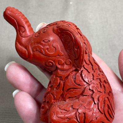 China Handcrafted Carved Red Resin and more Elephants