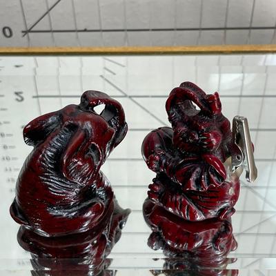 China Handcrafted Carved Red Resin and more Elephants