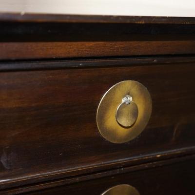 MCM ASIAN INFLUENCE EIGHT DRAWER TALL CHEST/ BRASS PEDAL SHAPED LEAVES AND BACK PLATE