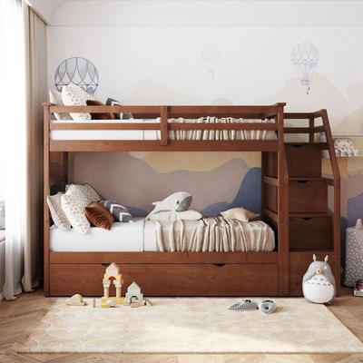 STAIRWAY BUNK BED OF TWO TWIN BEDS AND A TRUNDLE. CUBBIE STEPS. DOUBLE GUARD RAIL AND STEPS BUILT IN