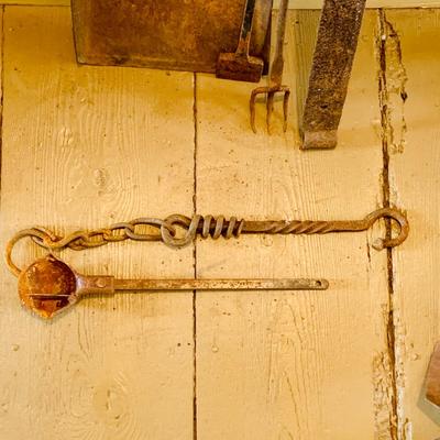 LOT 532: Assortment of Primitive Metal Tools Including Spikes, Dust Pan, Sconce and More