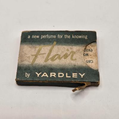 LOT 542: Antique Perfume Bottles, Talc Bottles, Ladies Handkerchiefs, Makeup , Greeting Cards, Face Cream, Face Fan, & Small Bud Vase