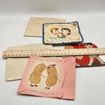 LOT 542: Antique Perfume Bottles, Talc Bottles, Ladies Handkerchiefs, Makeup , Greeting Cards, Face Cream, Face Fan, & Small Bud Vase