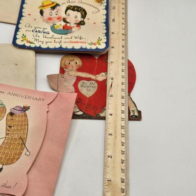 LOT 542: Antique Perfume Bottles, Talc Bottles, Ladies Handkerchiefs, Makeup , Greeting Cards, Face Cream, Face Fan, & Small Bud Vase