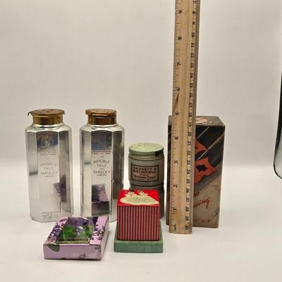 LOT 542: Antique Perfume Bottles, Talc Bottles, Ladies Handkerchiefs, Makeup , Greeting Cards, Face Cream, Face Fan, & Small Bud Vase