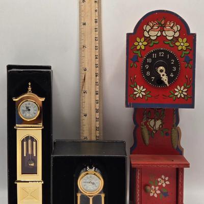 LOT 546: Vintage German Wooden Miniature Grandfather Clock, Miniature Gold Tone Grandfather Clock, & Miniature Gold Tone Mantle Clock