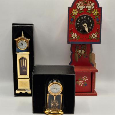 LOT 546: Vintage German Wooden Miniature Grandfather Clock, Miniature Gold Tone Grandfather Clock, & Miniature Gold Tone Mantle Clock