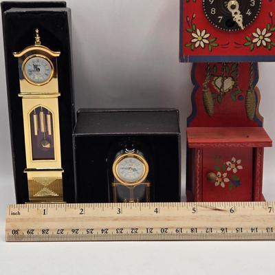 LOT 546: Vintage German Wooden Miniature Grandfather Clock, Miniature Gold Tone Grandfather Clock, & Miniature Gold Tone Mantle Clock