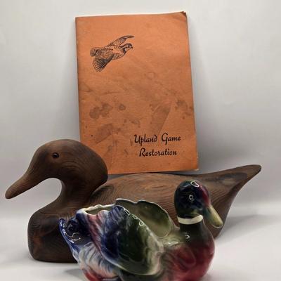 LOT 552: Carved Wooden Duck, Duck Planter, & Upland Game Restoration Book