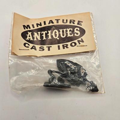 LOT 553: Miniatures of All Sorts, Including Musical Instrument Playing Monkeys, Salt & Pepper Shakers, Vase, Pitcher, & Kodak...