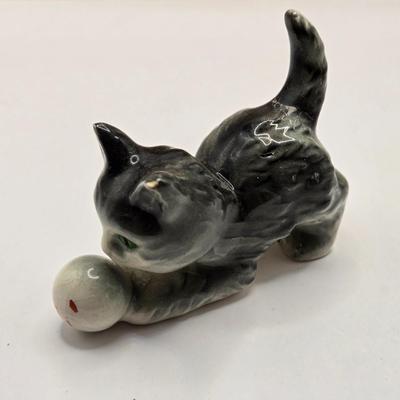 LOT 553: Miniatures of All Sorts, Including Musical Instrument Playing Monkeys, Salt & Pepper Shakers, Vase, Pitcher, & Kodak...