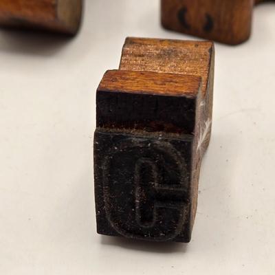 LOT 554: Miniature Wooden Train, Trucks, & Wooden Stamper Set
