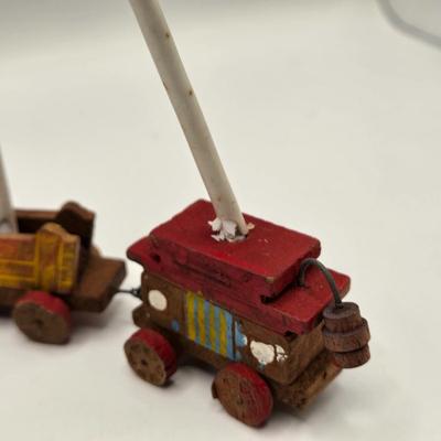 LOT 554: Miniature Wooden Train, Trucks, & Wooden Stamper Set