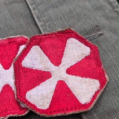 LOT 556: Army Jacket, Multiple Patches, Notice of Recruitment, Metal Pins, Cannon, & Charm, Postcard, & First Aid smelling Salts