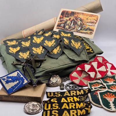 LOT 556: Army Jacket, Multiple Patches, Notice of Recruitment, Metal Pins, Cannon, & Charm, Postcard, & First Aid smelling Salts