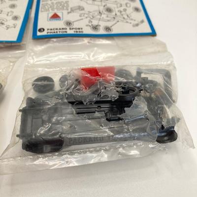 LOT 557: Coastal Ertl Die Cast Coin Bank, Citgo Patches and Vintage Classic Car Collection Models