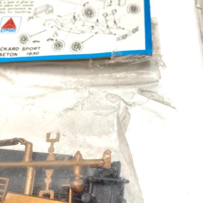 LOT 557: Coastal Ertl Die Cast Coin Bank, Citgo Patches and Vintage Classic Car Collection Models