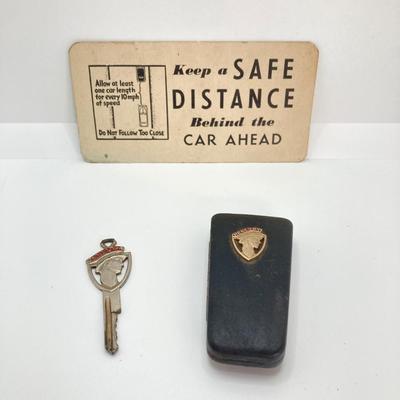 LOT 560: Vintage El Camino Camper Car, Metal Firebird Car Badge / Emblem, Mercury Key with Key Holder and More