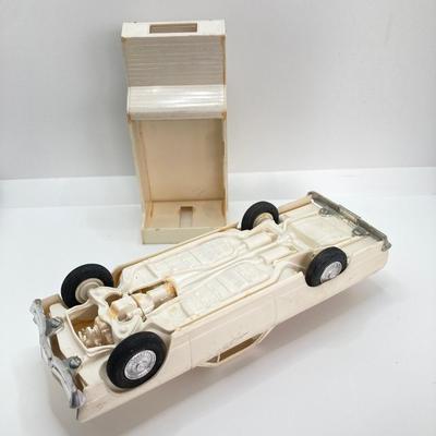 LOT 560: Vintage El Camino Camper Car, Metal Firebird Car Badge / Emblem, Mercury Key with Key Holder and More