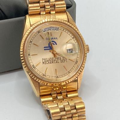 LOT 565: Pair of Vintage Conrail Calendar Watches - Helbros and More