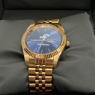 LOT 565: Pair of Vintage Conrail Calendar Watches - Helbros and More