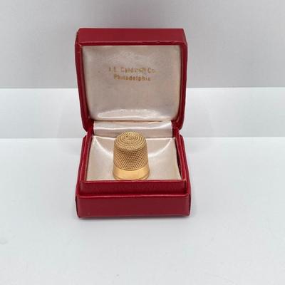 LOT 579: 14KT Gold Thimble - TW 4.79g