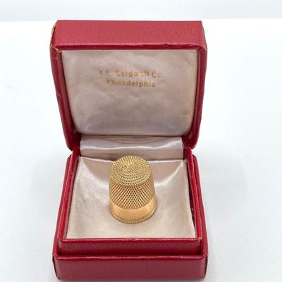 LOT 579: 14KT Gold Thimble - TW 4.79g