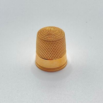 LOT 579: 14KT Gold Thimble - TW 4.79g