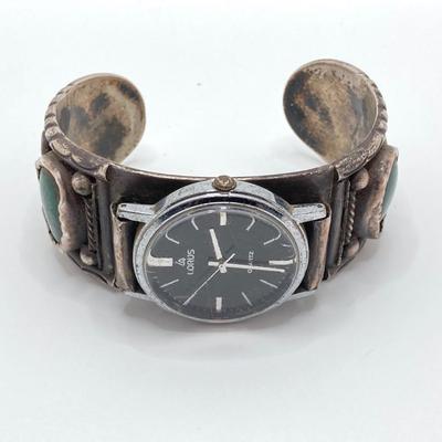 LOT 581: Lorus Quartz Watch with Artisan Crafted Cuff Band