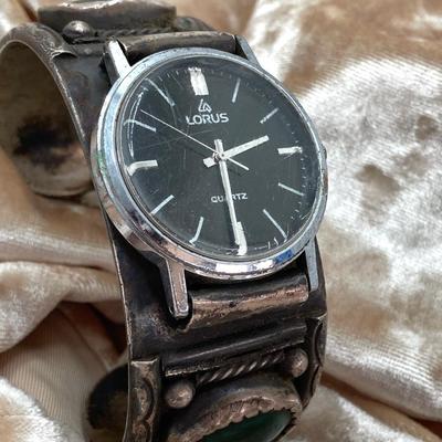 LOT 581: Lorus Quartz Watch with Artisan Crafted Cuff Band
