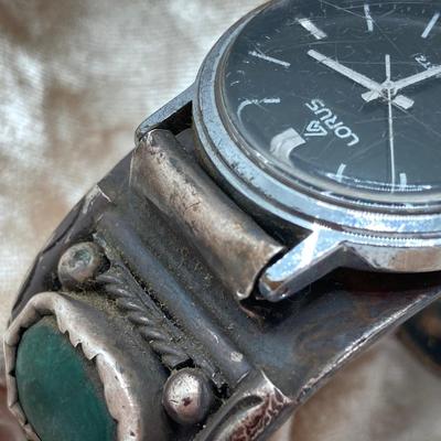 LOT 581: Lorus Quartz Watch with Artisan Crafted Cuff Band