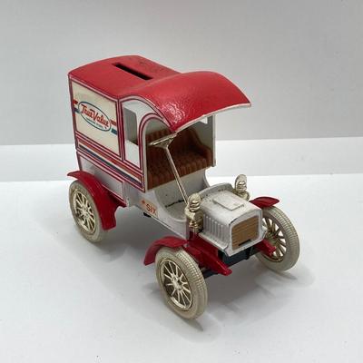 LOT 582: Ford Automobile Collection - Toy Cars, True Value Ertl Bank and Trivet