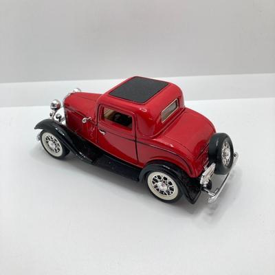 LOT 582: Ford Automobile Collection - Toy Cars, True Value Ertl Bank and Trivet