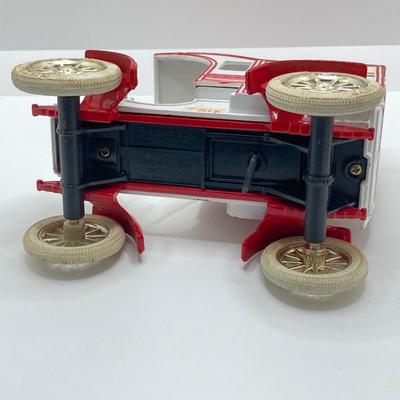 LOT 582: Ford Automobile Collection - Toy Cars, True Value Ertl Bank and Trivet