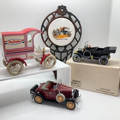 LOT 582: Ford Automobile Collection - Toy Cars, True Value Ertl Bank and Trivet