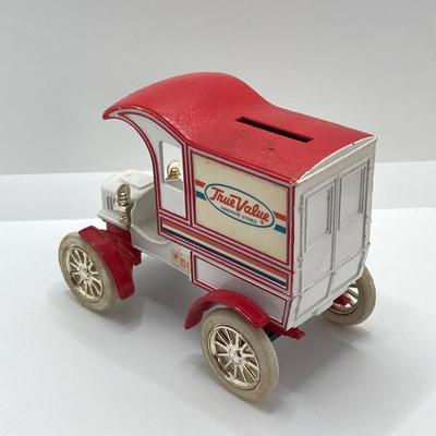 LOT 582: Ford Automobile Collection - Toy Cars, True Value Ertl Bank and Trivet