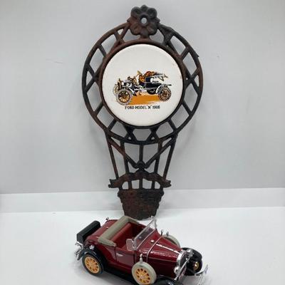 LOT 582: Ford Automobile Collection - Toy Cars, True Value Ertl Bank and Trivet
