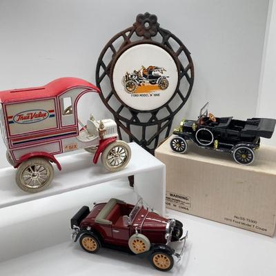 LOT 582: Ford Automobile Collection - Toy Cars, True Value Ertl Bank and Trivet