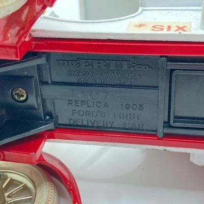 LOT 582: Ford Automobile Collection - Toy Cars, True Value Ertl Bank and Trivet