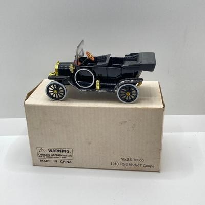 LOT 582: Ford Automobile Collection - Toy Cars, True Value Ertl Bank and Trivet