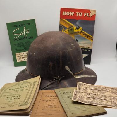 LOT 602: Antique Miner's Helmet, 1945 William Piper Flight Manuel, Philadelphia Navy Yard Safety Handbook, Profit sharing Redemption...